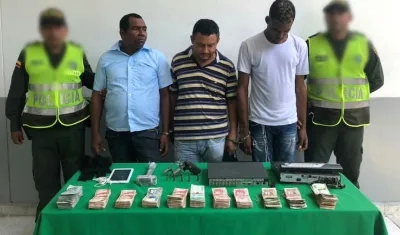 Los tres capturados.