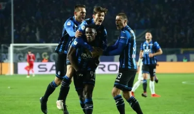 Duván Zapata festeja uno de sus dos tantos ante la Juventus. 