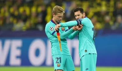 Frenkie De Jong y Lionel Messi. 