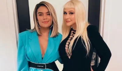 Las cantantes Karol G y Christina Aguilera.
