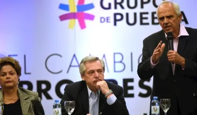 El expresidente Ernesto Samper (derecha).