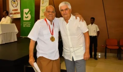 El fotógrafo Pedro Anchila y Julio Comesaña.