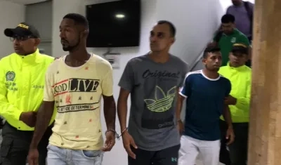 Los tres capturados.