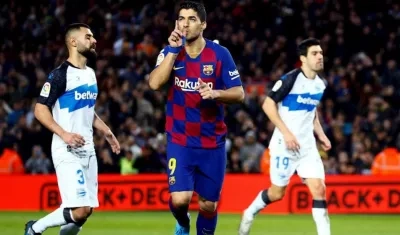 Luis Suárez celebra un gol con el Barcelona. 