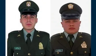 Álvaro Iván Marín Marín y Juan Carlos Barreto Guzmán, agentes asesinados.