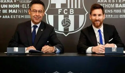 Josep Maria Bartomeu y Lionel Messi.