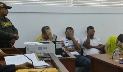 Los cuatro capturados.