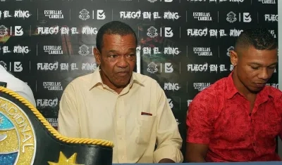 Emiliano Villa junto a Hugo Berrío, campeón nacional supergallo.