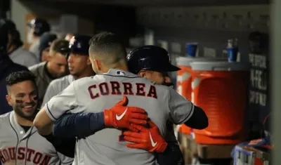 Los Astros de Houston celebran, tras una anotación. 