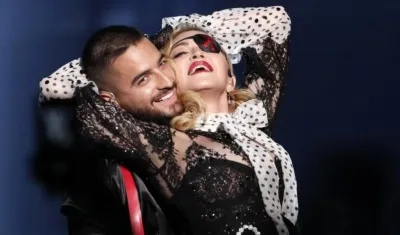 Los cantantes Maluma y Madonna.