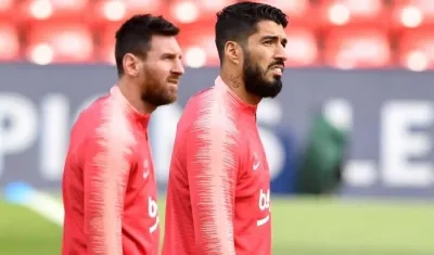 Lionel Messi y Luis Suárez.