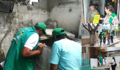 Los funcionarios que recorrieron los barrios.