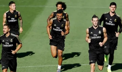 James Rodríguez y Gareth Bale en el entrenamiento del Real Madrid. 