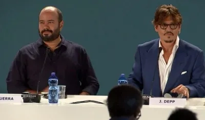 El cineasta Ciro Guerra y el actor Johnny Depp.