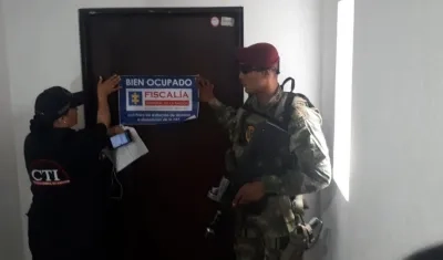 Una casa, cuatro lotes, doce apartamentos y tres locales.