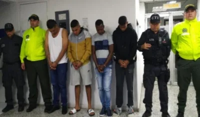 Los cuatro capturados.