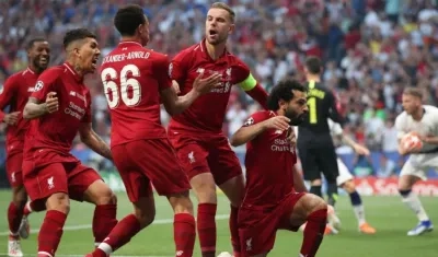 Futbolistas del Liverpool.