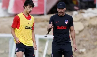 Joao Félix y Diego Simeone.