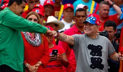 Nicolás Maduro y Diego Maradona. 
