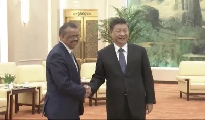 Presidente chino Xi Jinping y el Director General de la OMS, Tedros Adhanom Ghebreyesu.