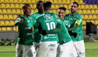 Agustín Palavecino celebra el gol del empate de Cali. 