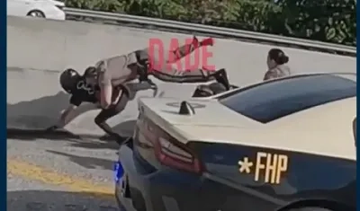 Momento en que el Policía se lanza sobre el sospechoso. 