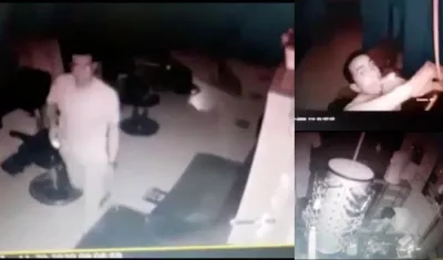 Momento en que el ladrón robaba el local comercial. 