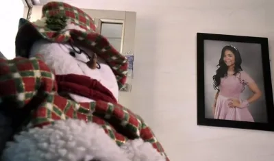 Una foto de Madelayne adorna su casa.