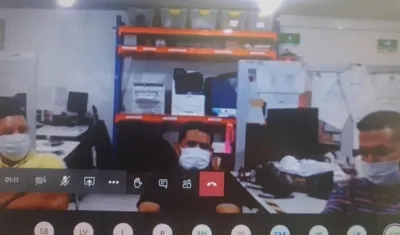 Los tres policías durante la audiencia de legalización de capturas. 