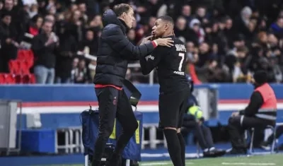 Thomas Tuchel y Kylian Mbappé.
