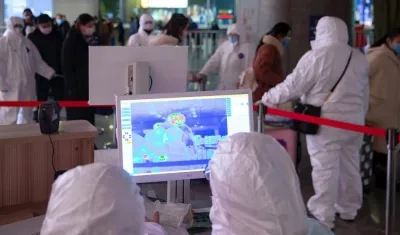 Funcionarios de la OMS en China.