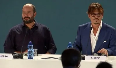 El cineasta colombiano Ciro Guerra y el actor estadounidense Johnny Depp.