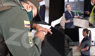 Momento en el que les imponen el comparendo.