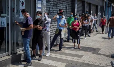Las filas en los supermercados de Caracas.