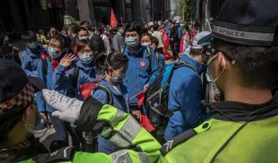 Un centenar de enfermeras se despidió este lunes de Wuhan.
