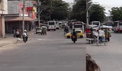 Buses de las dos empresas en la carrera 38 entre calles 33 y 35.