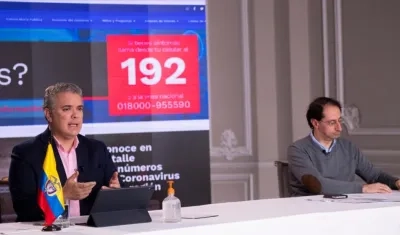 Presidente Iván Duque y el Ministro de Comercio Exterior José Manuel Restrepo.