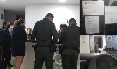 Momento en el que cierran el lugar y colocan el comparendo.