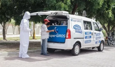 SuperGiros al barrio, en una calle de Barranquilla.