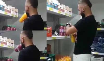 Momento en el que abre y bebe de las tres botellas de jugo.