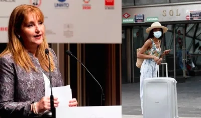 La presidenta y CEO de  WTTC, Gloria Guevara, izquierda, y una turista en Madrid.