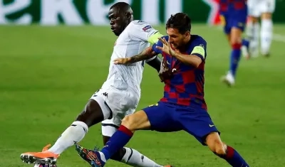 Kalidou Koulibaly y Lionel Messi.