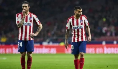 Sime Vrsaljko y Ángel Correa.