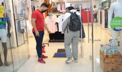 Protocolos de seguridad para el ingreso a los centros comerciales.