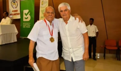 El fotógrafo Pedro Anchila y Julio Comesaña.