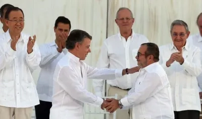 Juan Manuel Santos y Rodrigo Londoño.