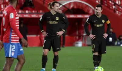 Lionel Messi y Antoine Griezmann. 