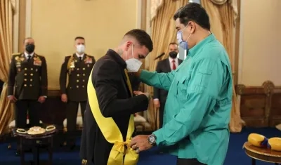 Roger Gutiérrez y Nicolás Maduro. 