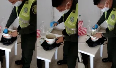 Momento en que sacaban el celular y la droga del balde de sopa. 