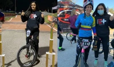 Sharid Fayad con los trofeos ganados y posando al lado de Mariana Pajón.